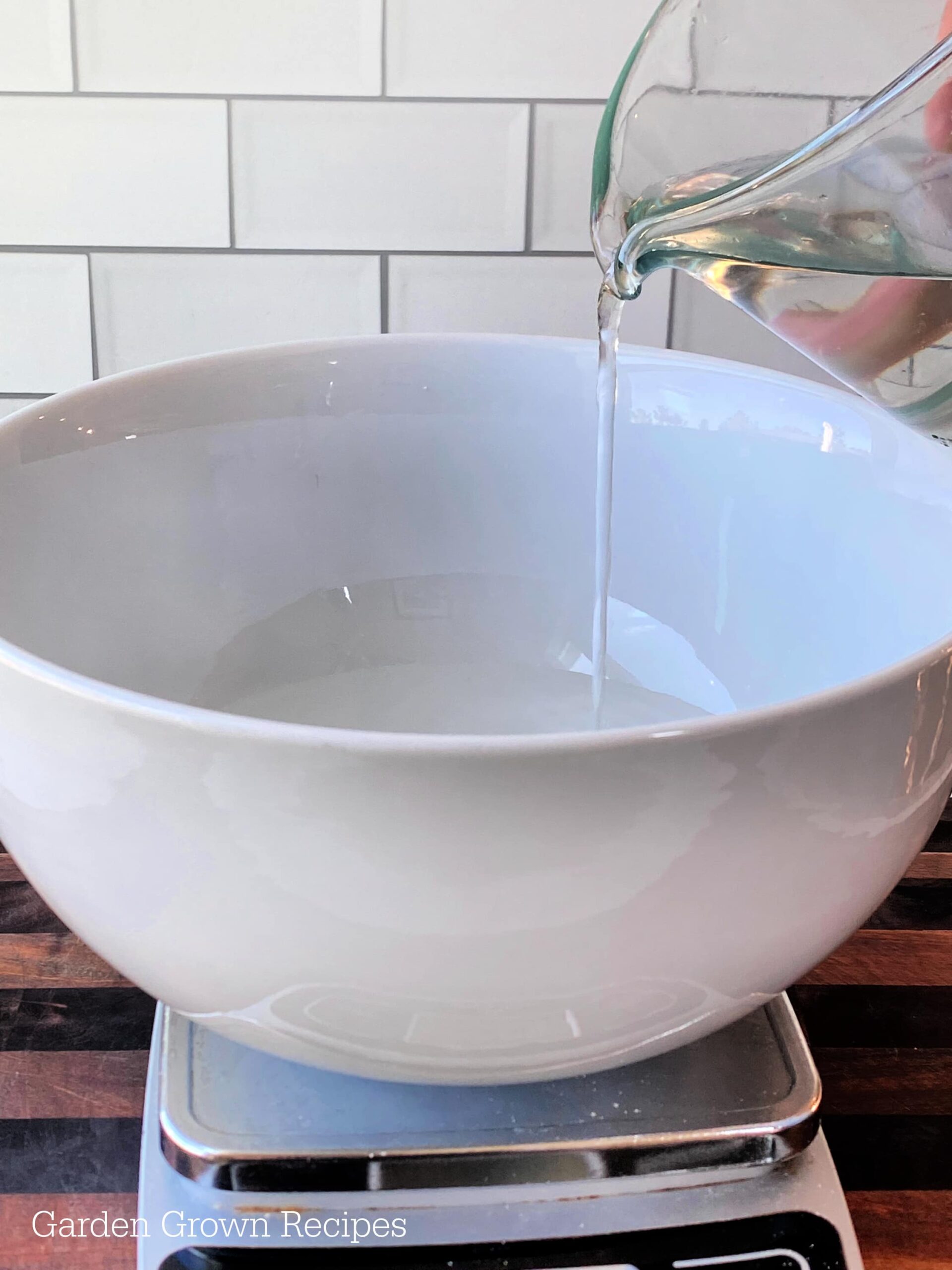 water in white bowl