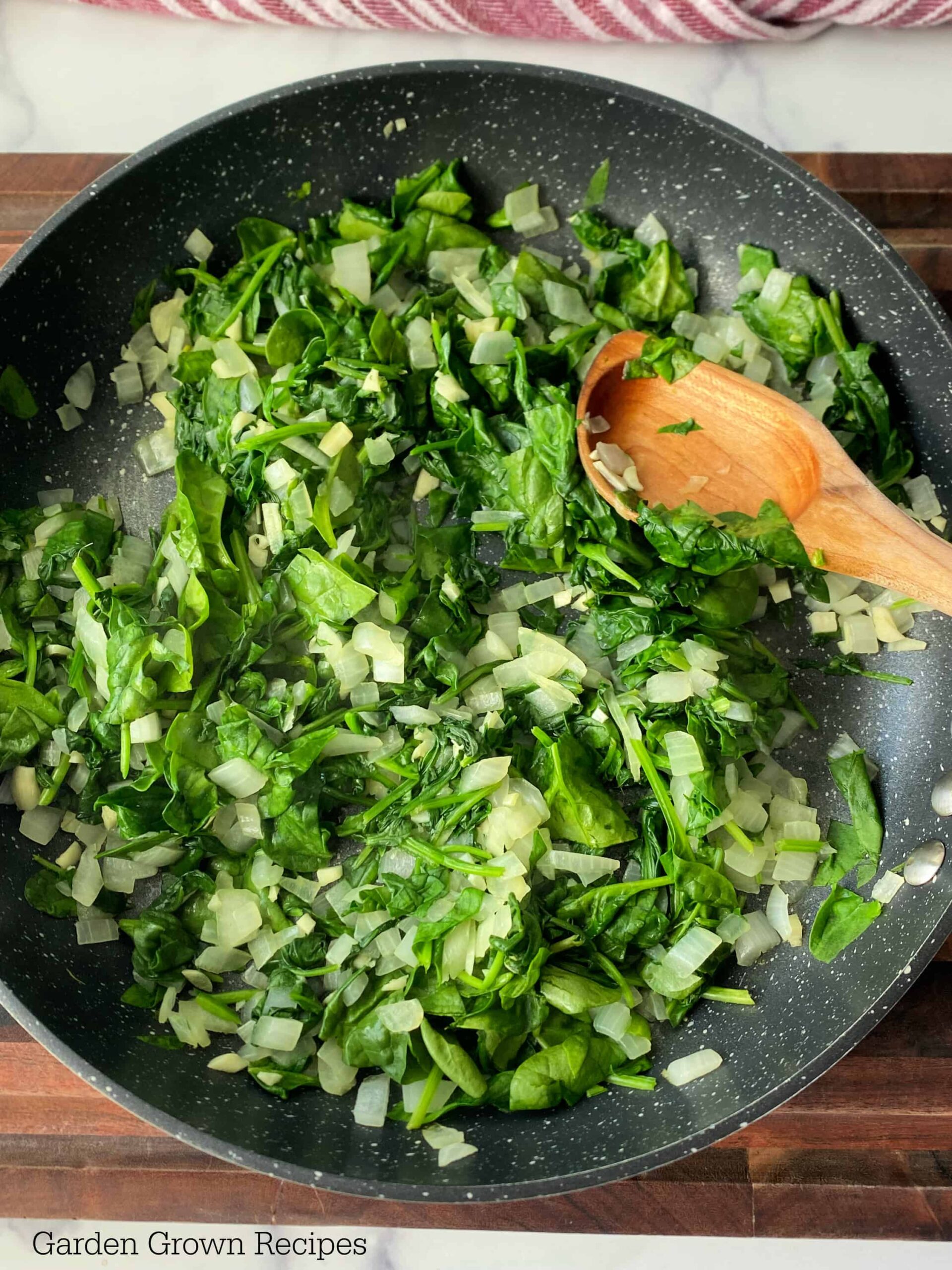 saute spinach with onions