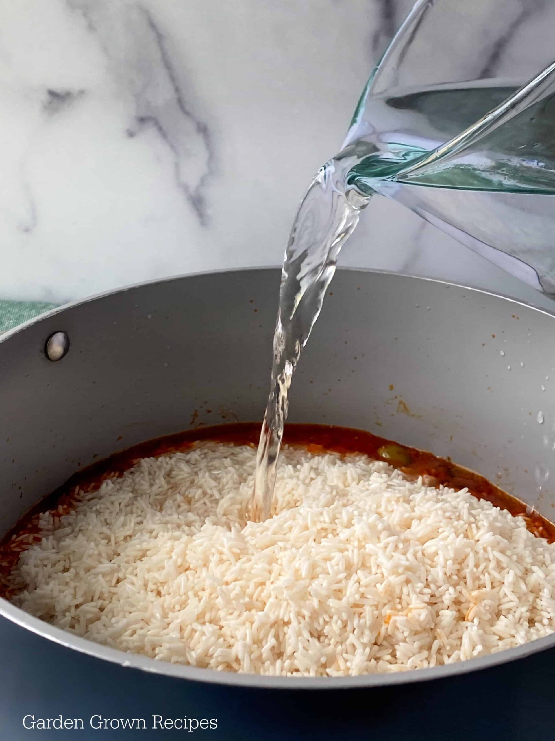 water and rice for Puerto Rican Rice Recipe 
